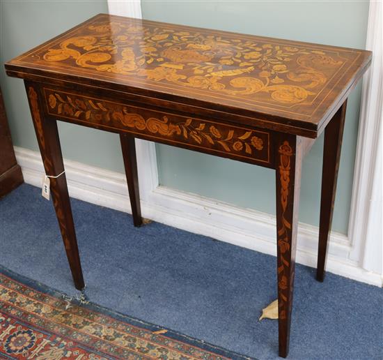 A 19th century Dutch mahogany and marquetry card table W.84cm